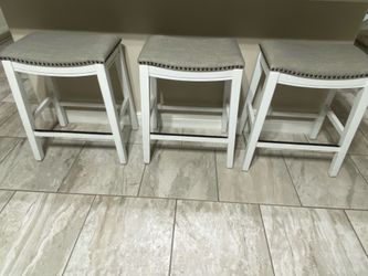 Set of Saddle Bar Stools