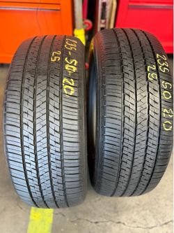 20” tires bridgestone 235/50/20 semi new with free installation $200 both
