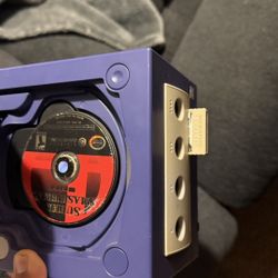 Game cube with melee and mario sunshine also tv adapter and 2 controllers.   price is negotiable 