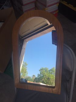 Mirror with hide away