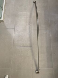 Chrome curved shower rod