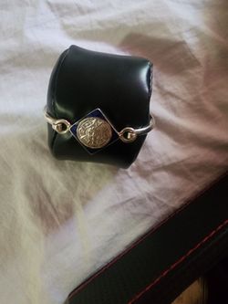 Brazalete y anillo de plata