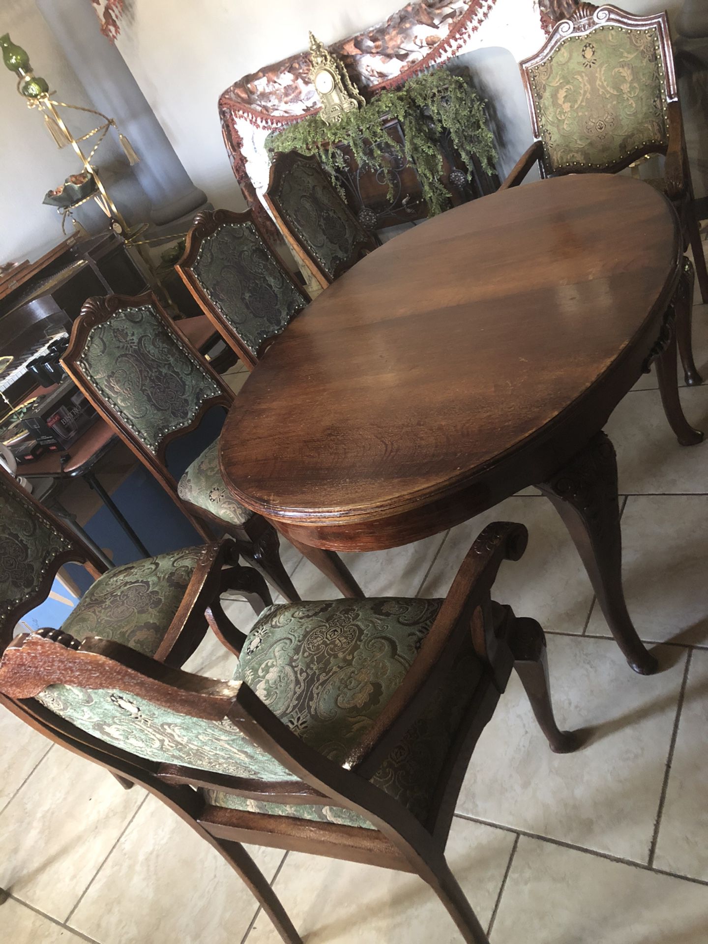 Antique dining room table with 6 chairs