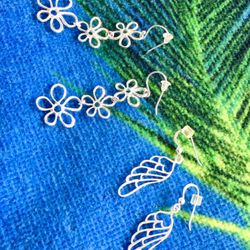Sterling Silver earrings 💜 3 Flowers connected long earring $20 / Angel wing silver earring  $15 