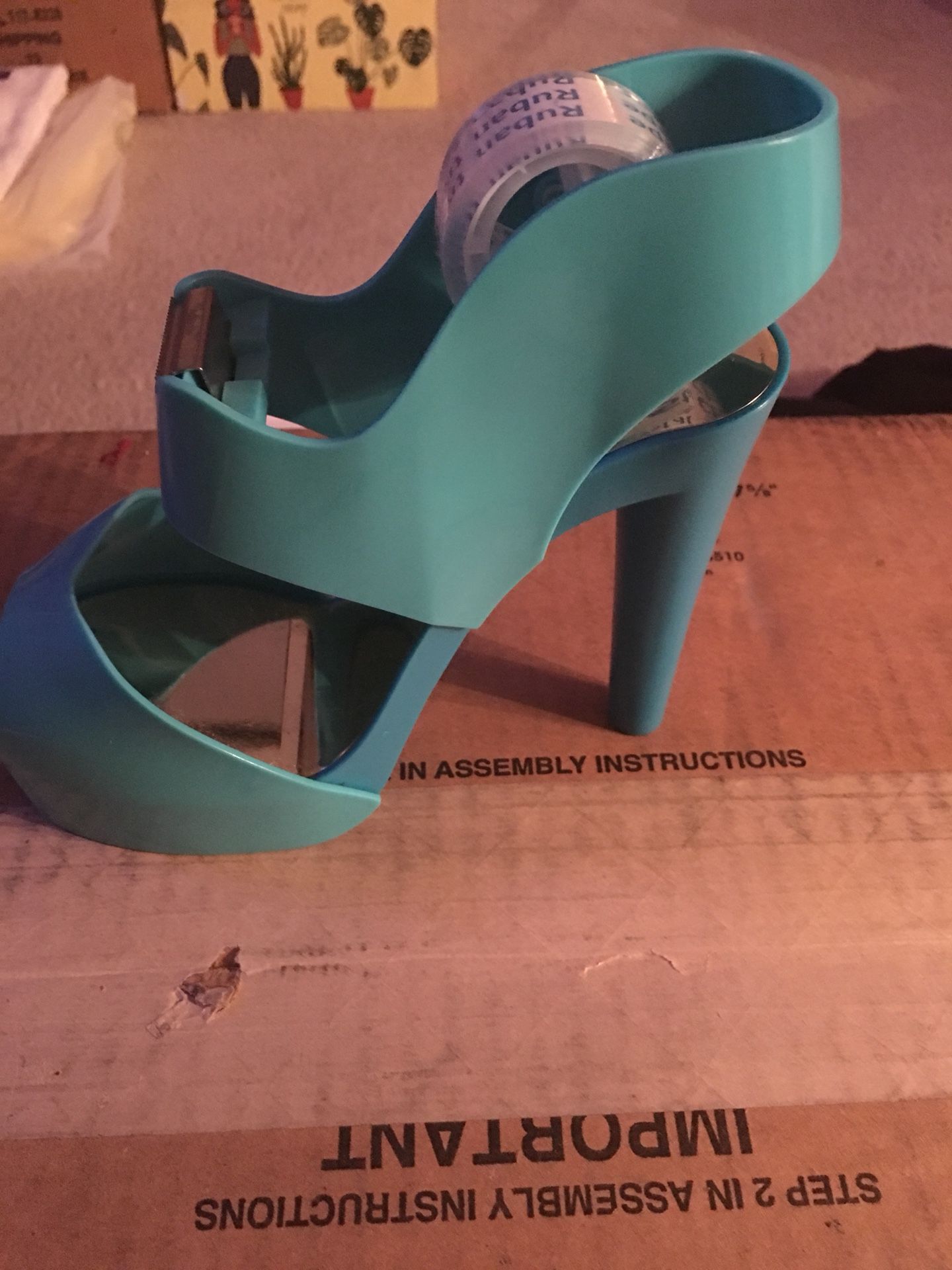 Blue shoe tape disperser