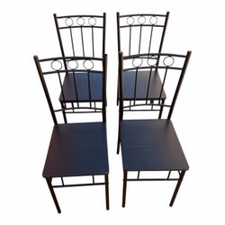 Four Black Farmer Dining Chairs, in good condition