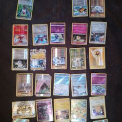 28 Holographic Rare Pokemon Cards Along With 102 Other Cards