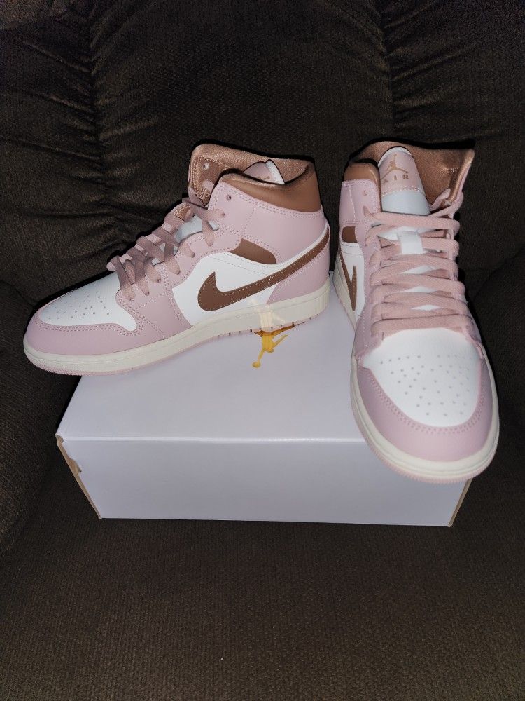 2 Pair Of Women's Jordan's Mid-tops