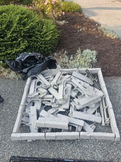 Approx 70 ft of gray landscape edging stakes