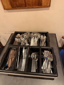 Large Lot of Stainless Steel Flatware and glassware