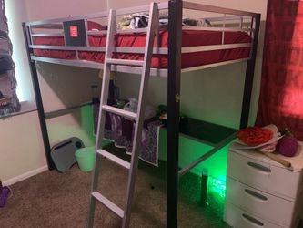 Bed with desk underneath