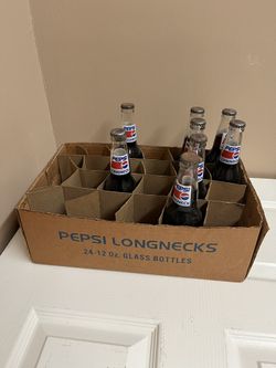 NASCAR Richard Petty Pepsi long neck bottle most consecutive wins 1967 10-in unopened full bottle Good condition collector's item