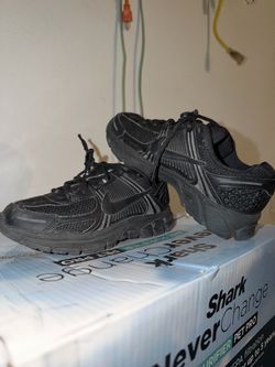 Kids black Nike size 4Y