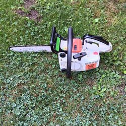 stihl chain saw with 14" bar model 009 has top handle runs great $200.00 firm. 
