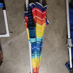 Rainbow colored beach umbrella