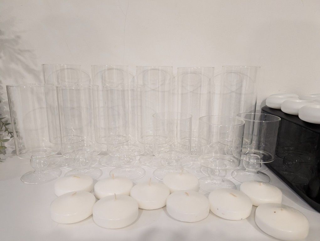 Vases With Flouting Candles 