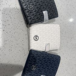Michael Kors - Passport Wallets 