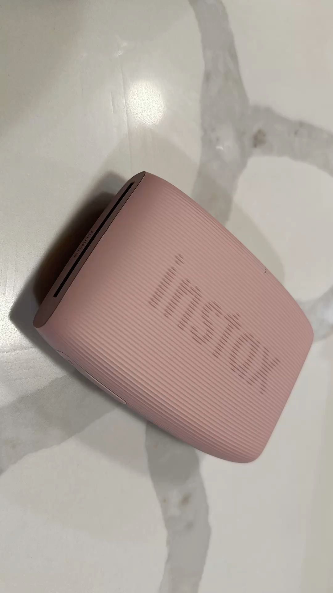 Pink fujifilm instax polaroid printer
