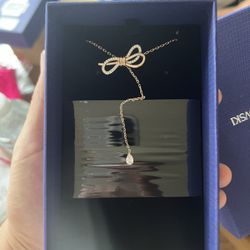 Swarovski Lifelong Bow Pendant, Women's White Crystal Bow Design Pendant Necklace with Mixed Rose - Gold Tone and Rhodium Plating