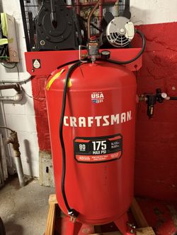 Craftsman 80-gallon, 175 PSI vertical air compressor.
