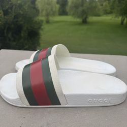 White Gucci slides (men’s size 8.5, Women’s 10)