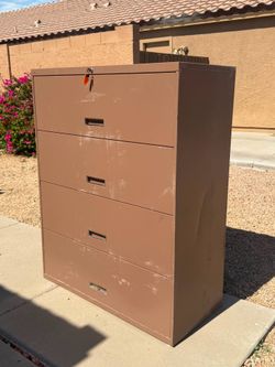 Brown Metal Locking Four Drawer Heavy Office File Cabinet (LxWxH: 19” x 42” x 52”)