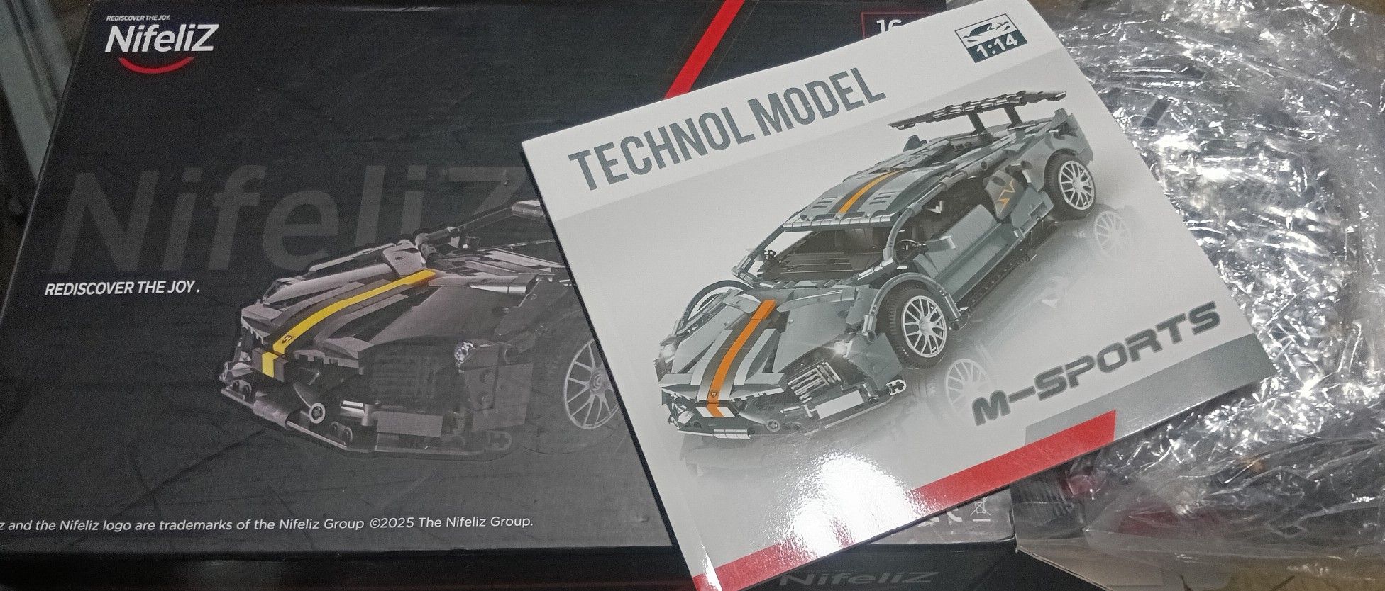 Nifeliz L670 Sports Car Model Lego with 1337 Pcs ( Brand New, Never Used, Sealed Bags ) For $30