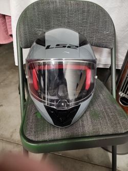 This is an LS2 Rapid series full-face motorcycle helmet in a Nardo Grey color finish.