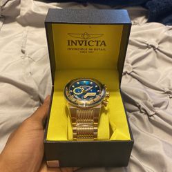 Gold Invicta Watch