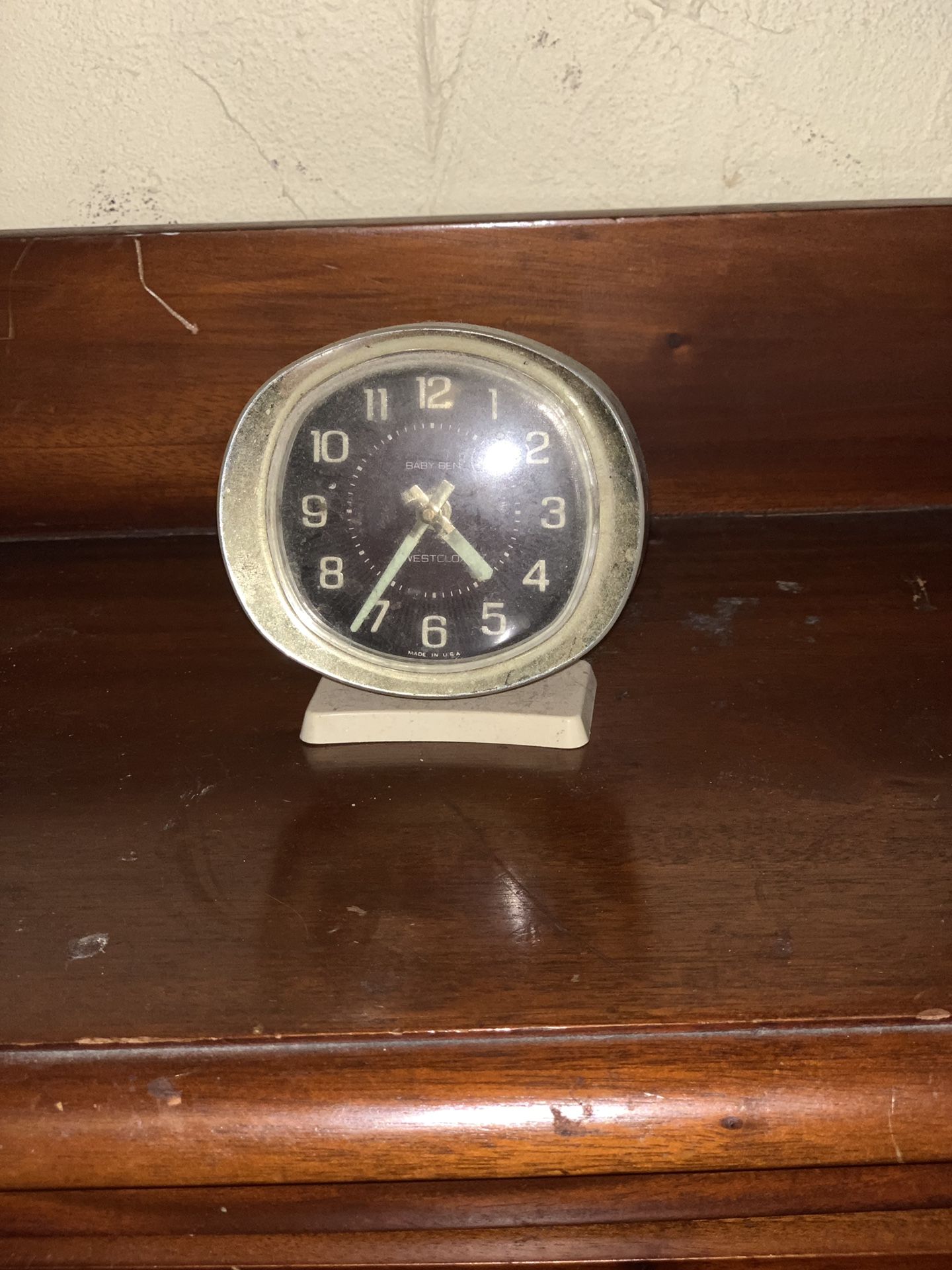 antique small clock