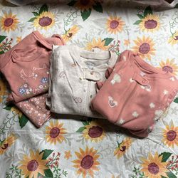 1) Pink and white onesie with rainbows and clouds 1) brownish gray hedgehog onesie 1) pink puppy and flowers onesie and pant set #babyfashion #threeou