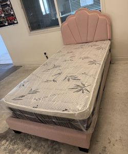 Twin size bed frame with pillow top mattress included