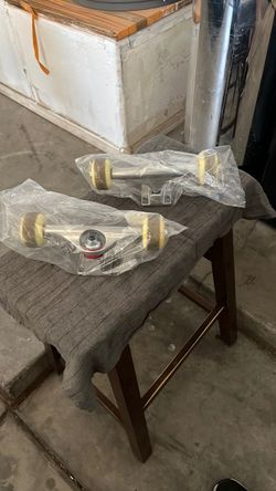 Skateboard trucks and wheels