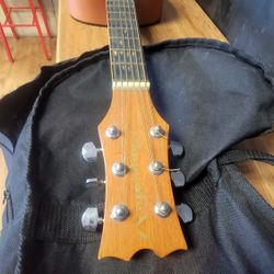 Small Playmate Acoustic Guitar 