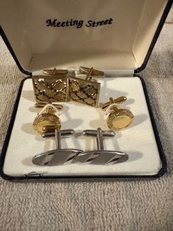 Three pair of men’s cuff links.