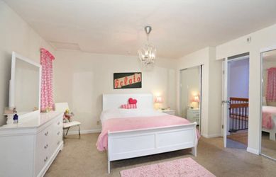 White wood bed frame and bed