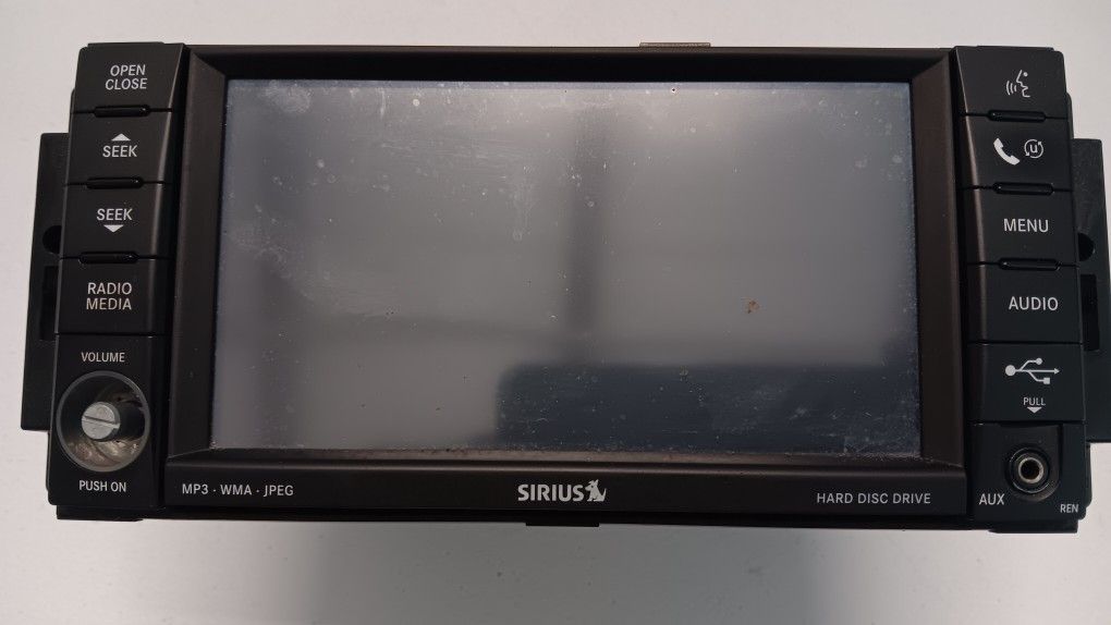 2010 Jeep Grand Cherokee Laredo Am/Fm Radio mp3 Sirius Satelite Head Unit.