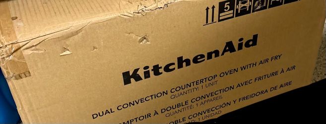 BRAND NEW KITCHENAID BLACK/ SILVER DUAL CONVECTION OVEN WITH AIR FRYER. PICKUP ONLY.