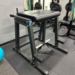 Near New Titan H-PND Reverse Hyper- Olympic Weight Plate Loaded 