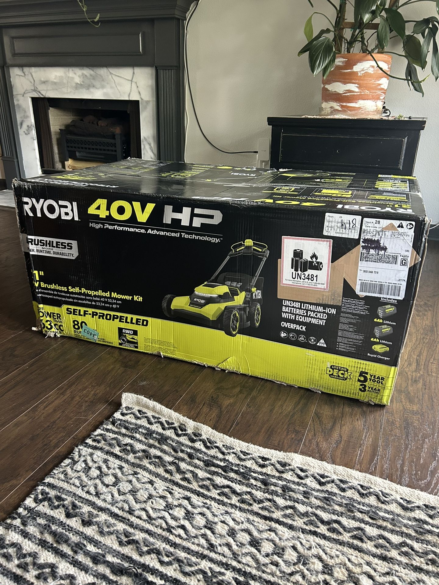 RYOBI 21in 40V brushless self-propelled mower kit with 2 batteries and charger