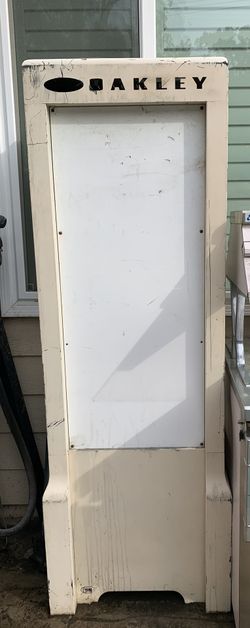 (Two) Oakley Metal Display Case