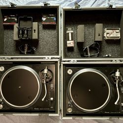 Pair of Pioneer PLX-1000 turntables & DJ Qbert Ortofon needles with flight cases