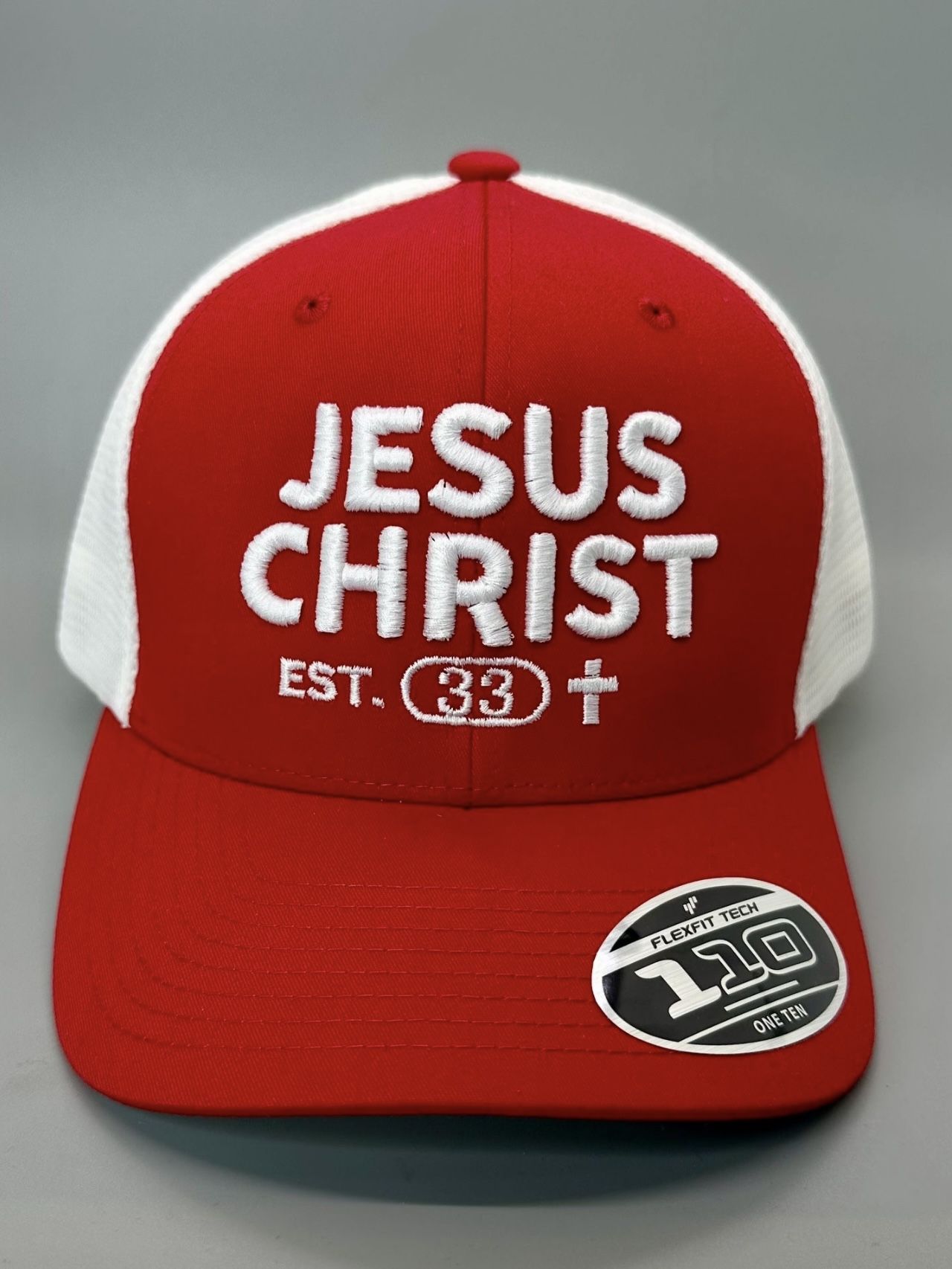 Jesus Christ EST. 33 Hat – Red & White Mesh Trucker Cap | GOD Back Embroidery
