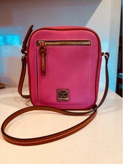 Dooney & Burke pebble cross body bag. Hot Pink. Strap drop 25 i ches