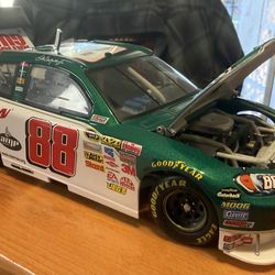 Dale Earnhardt Jr. #88 diecast car. including wooden box/shelf
