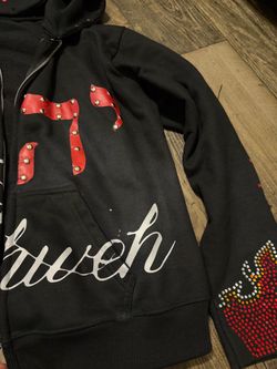 Black Zip-Up Hoodie with Studded Graphic Design