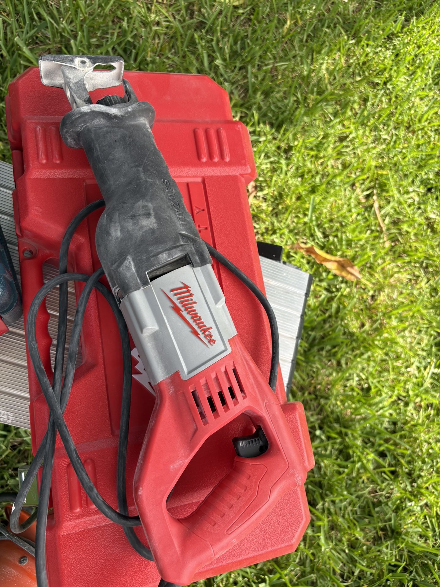 Milwaukee corded reciprocating saw with case