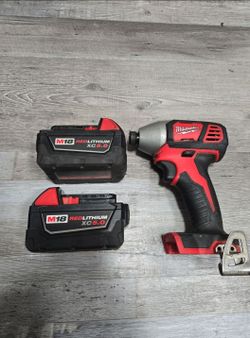 2... MILWAUKEE BATTERYS XC5.0 AND IMPACT DRIVER