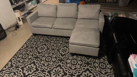 Small couch with ottoman.  Brand new never used.