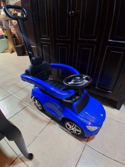 Mercedes convertible ride on push car